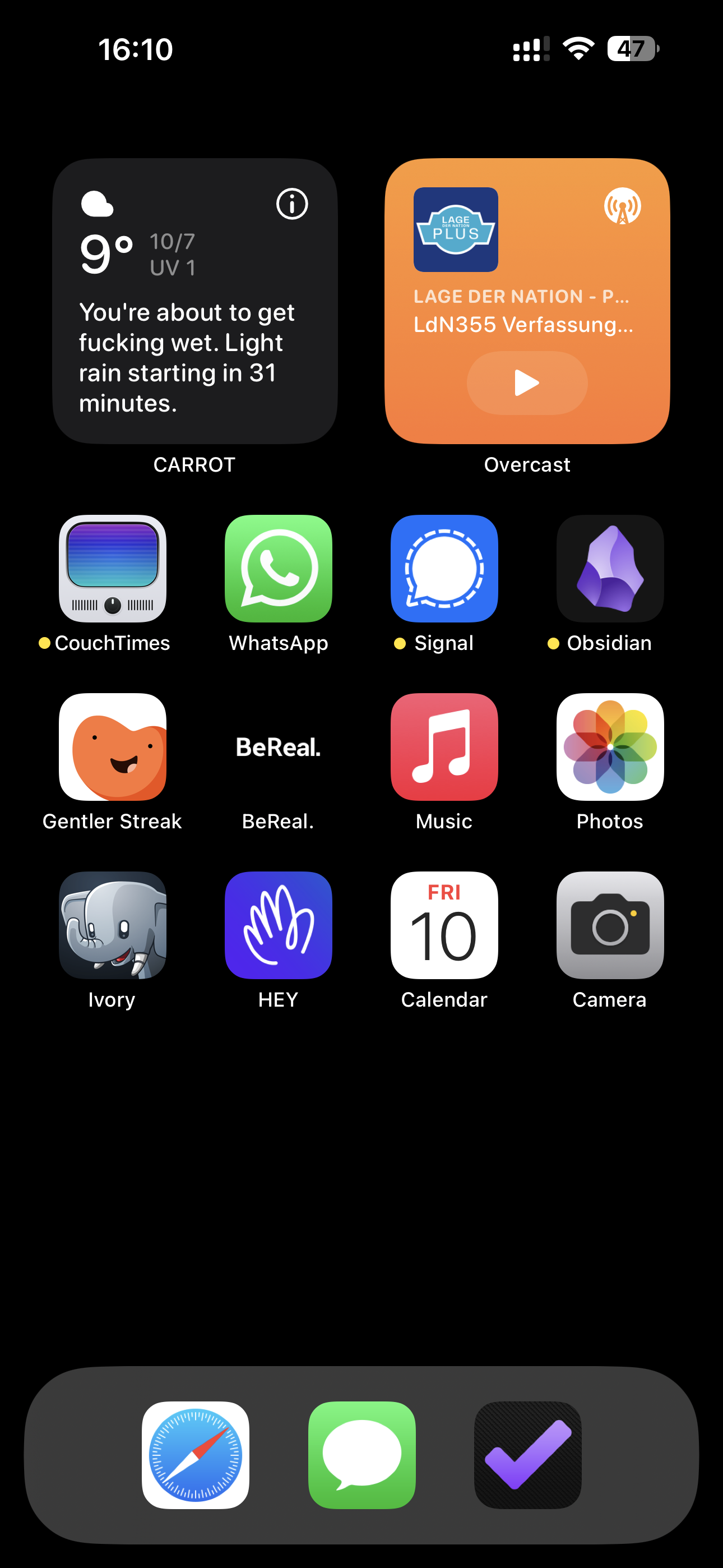 An iPhone Home Screen with a black background. At the top are two small widgets: CARROT weather and Overcast. Below that are three rows of apps: CouchTimes, WhatsApp, Signal, Obsidian, Gentler Streak, BeReal, Music, Photos, Ivory, HEY, Calendar and Camera. The dock has three apps: Safari, Messages & OmniFocus 4