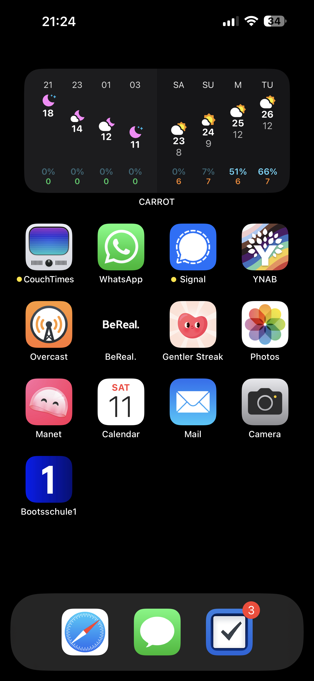 An iOS home screen with a black background. At the top is a CARROT Weather
widget with a dark gray background, showing the next four hours and the next
four days. Below that are 17 apps: CouchTimes, WhatsAPp, Signal, YNAB,
Overcast, BeReal., Gentler Streak, Photos, Manet, Calendar, Mail, Camera,
Bootsschule1.
